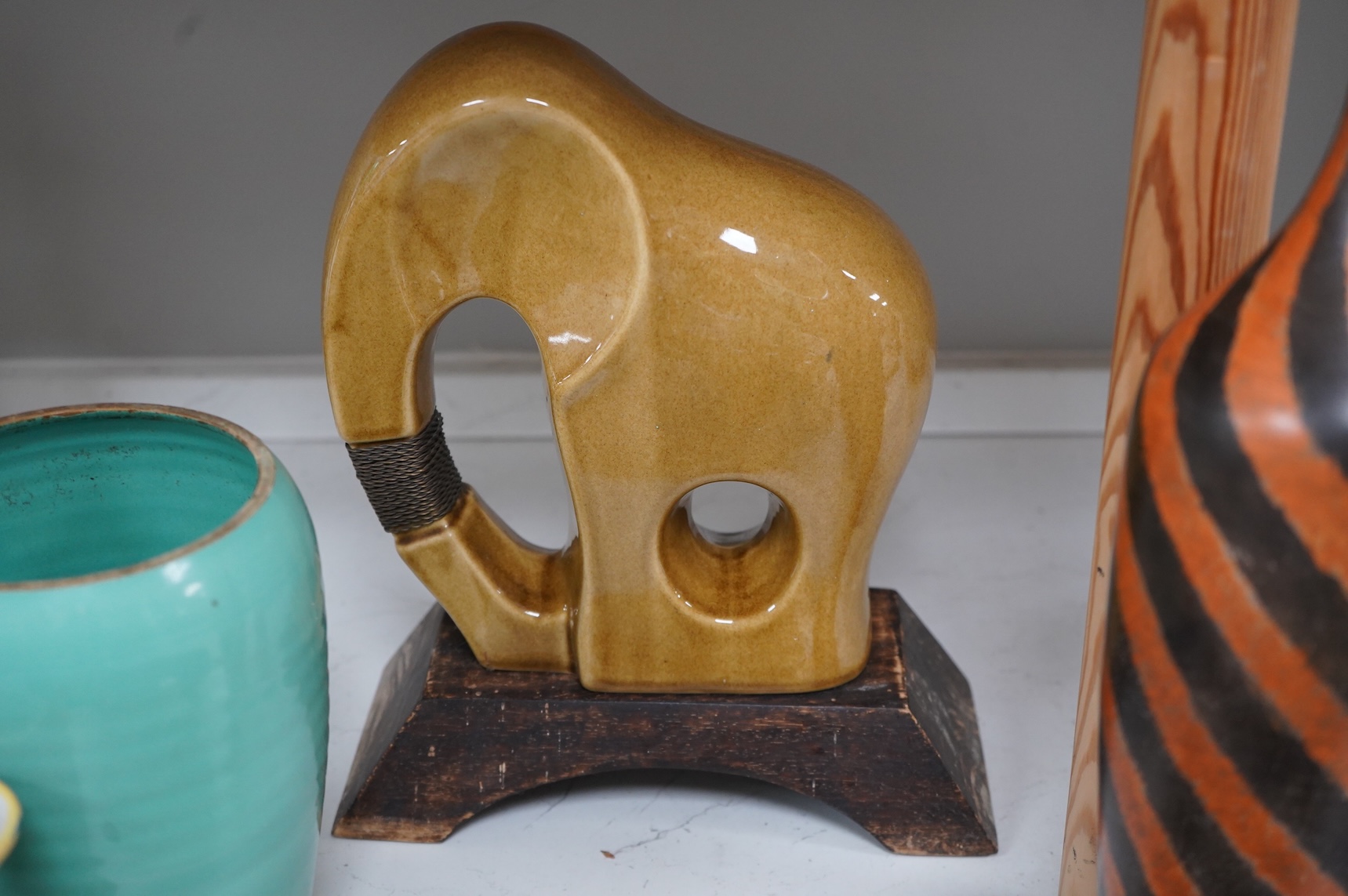 A collection of ceramics to include a Poole turquoise vase, modernist elephant and Santo Stefano di Camastra vase, largest 37cm high